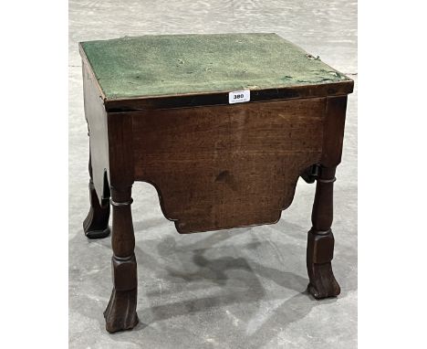 An 18th Century mahogany commode on turned legs with Braganza feet. 18" wide.