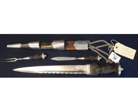 Edward VII Scottish Regimental Officers dirk having main blade with single edge and thumb indented top edge, carved basket we