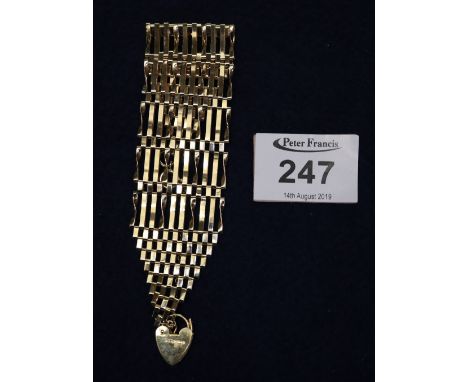 A ten bar 9ct gold gate bracelet, approx weight 19g.(B.P. 24% incl. VAT) 