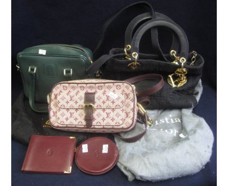 Collection of designer style handbags to include; a black covering bag marked DAKS containing a green snake effect handbag la