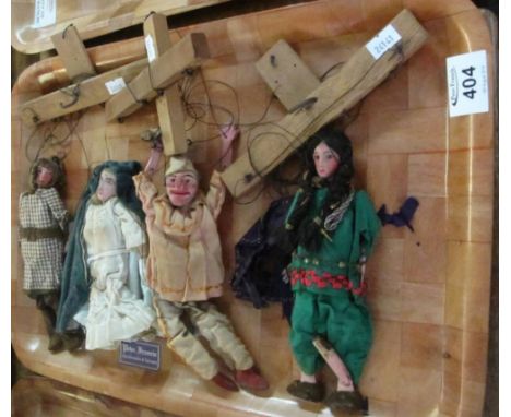 Four vintage wooden puppets including; Punch, with movable limbs and clothing. (B.P. 24% incl. VAT)