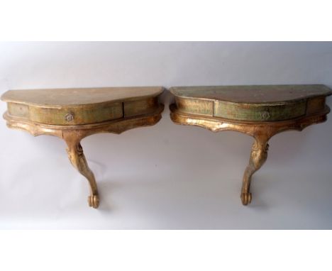 A pair of Italian giltwood small console tables, with D shaped tops, above a drawer, on a single scroll support, 51cmW