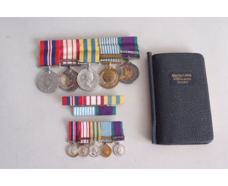 A group of five George VI and Elizabeth II medals comprising, 1939-1945 War Medal (unnamed), a George VI Naval General Servic