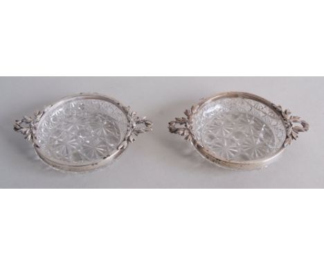 A pair of Victorian silver and cut glass trinket trays, by William Sutton & Sons, London 1894, of circular form with twin scr