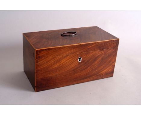A Georgian mahogany and boxwood banded tea caddy, the rectangular lid opening to reveal central mixing bowl with fern leaf en