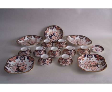 A Royal Crown Derby part tea set in the Imari `383` pattern to include ten cups and saucers, two octagonal serving plates, a 