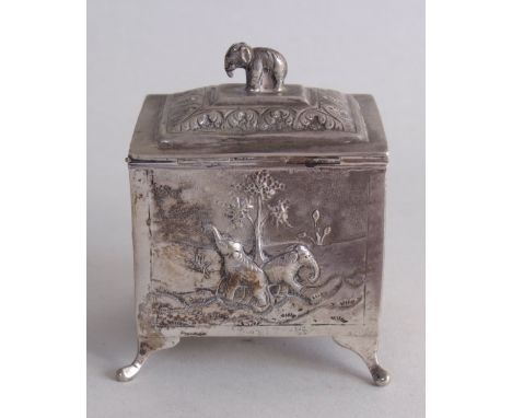 A late 19th century Indian repoussé tea caddy, circa 1890, rectangular carved in relief with tigers, deer and elephants in na