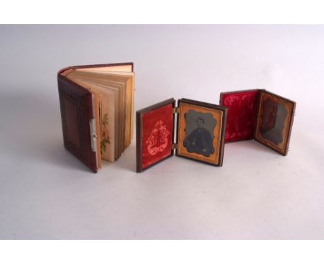 Two Victorian cased daguerreotype portrait miniatures, in decorative gilt frames with foliate scrolling, one in leather case,