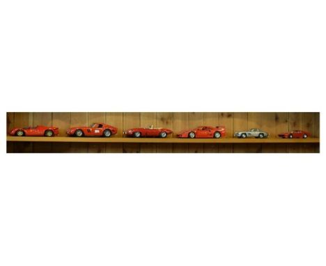 Six assorted scale model vehicles comprising: 1/18 scale Ferrari 330, Ferrari GTO, Burago Jaguar E-type and Ferrari F40, toge