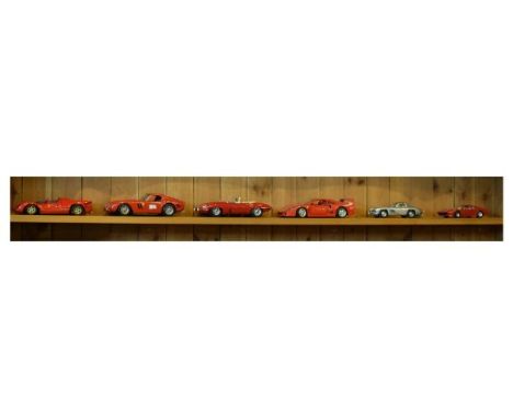 Six assorted scale model vehicles comprising: 1/18 scale Ferrari 330, Ferrari GTO, Burago Jaguar E-type and Ferrari F40, toge