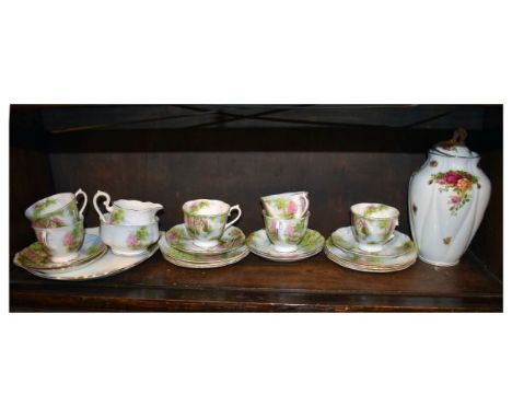 Royal Albert 'The Old Mill' pattern tea service, together with an Old Country Roses pattern ovoid jar and cover   Condition: 