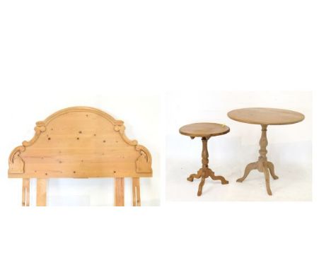 Two natural pine circular tripod occasional tables and a double bedhead   Condition: 