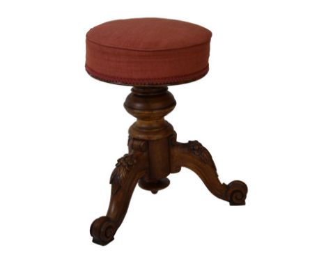 Victorian walnut revolving music stool on tripod base   Condition: 