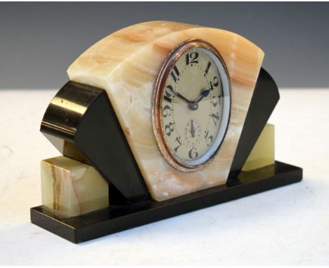 1930's period slate and marble mantel clock having oval dial and Arabic numerals, 11cm high   Condition: 