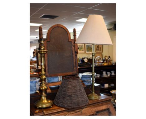 19th Century bronze ecclesiastical style table candlestick remodelled as lamp base, together with an adjustable tubular teles