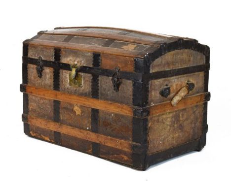 Early 20th Century dome top sea chest or trunk with wooden ribs and studded iron strap work   Condition: 