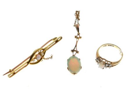 9ct gold dress ring set central opal with white stone shoulders, an opal and seed pearl set bar brooch stamped 15ct, together