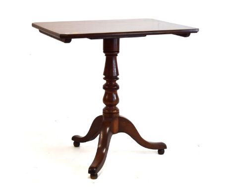 19th Century mahogany tripod occasional table, the canted oblong top on turned stem and three splayed supports   Condition: 