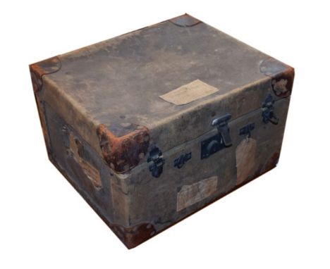 Early 20th Century canvas trunk containing a pair of riding breeches, pair of brown leather riding boots, pair of bone-handle