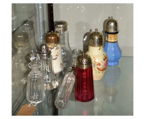 Various ceramic and glass sugar sifters, glass dressing table requisites having silver plated tops etc   Condition: 