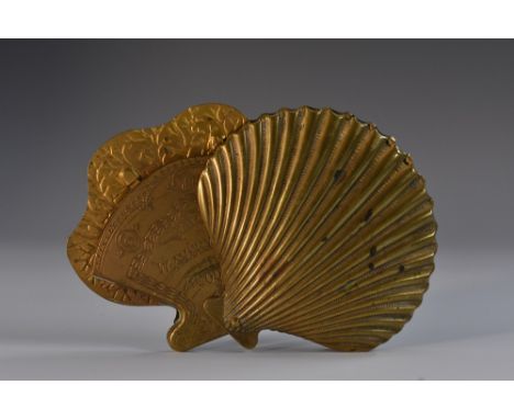 A Victorian novelty Patent brass needle case, by Wavery & Son of Redditch, as a scallop seashell, the pivoting slip with fan-