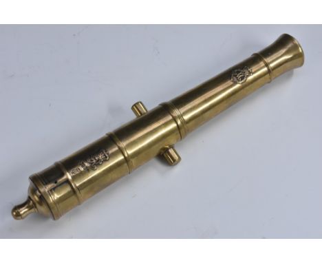 An early 20th century bronze desk model signal cannon, applied with crowned GR crest and M within a wreath, and numbered 380 