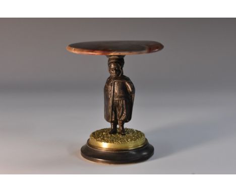 An agate, dark patinated and parcel-gilt bronze miniature table, circular top, figural pillar cast as a young girl wearing a 