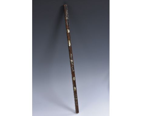 A 19th century Chinese hardwood and mother-of-pearl ruler, inlaid with flowers and scrolling leaves, 43cm wide, c. 1890