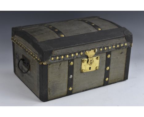 A travelling trunk or document box, hinged domed cover, brass studded borders, 35.5cm wide 