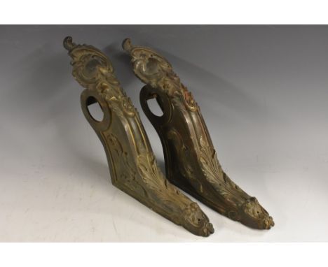 A pair of French dark patinated bronze curtain pole brackets, cast with acanthus scrolls and cartouches, 24cm wide, c.1870  