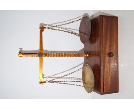Set of vintage balancing scales with precision weights