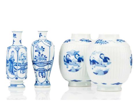 A pair of Chinese blue &amp; white barrel shape vases, with round panels depicting boys at play, against a ribbed body, betwe