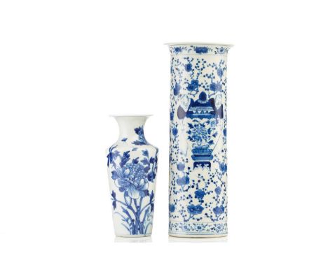 A Chinese blue &amp; white vase, Qing, 18th century, painted with a bird upon a stem of tree peony, double concentric blue ri