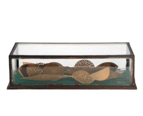 A cased collection of four Persian (Abadeh) carved and pieced pearwood Sherbet spoons (Qashuq), late 19th century, with intri