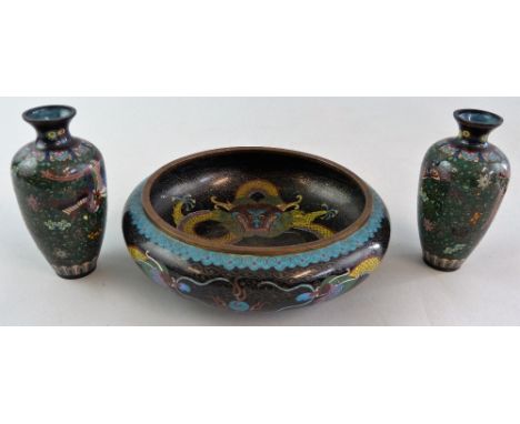 A Chinese cloisonne dragon bowl, of flattened circular form depicting dragons chasing the flaming pearl, large cloisonne four