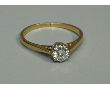 A diamond and 18ct gold solitaire ring, the claw set round brilliant cut diamond weighing approx 0.50ct,  size O, total gross