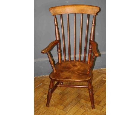 A 19th century beech and elm stick back Windsor armchair