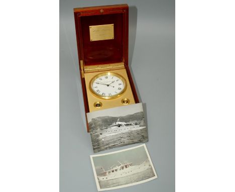 A Patek Phillippe marine chronometer, Naviquartz 1215, numbered 1.801.284. In a three section mahogany brass bound case. Bear