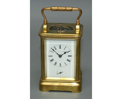 Edward and Sons, (retailer), an early 20th century brass, five glass carriage clock, the repeating French movement striking u