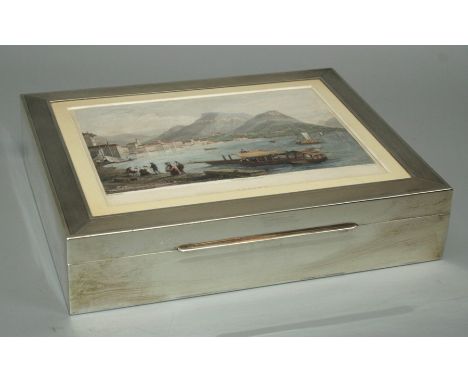 A large sterling silver cigar box of rectangular form, the hinged cover with engine turned banding, set with a coloured engra