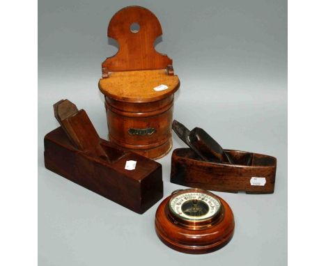 A 19th century moulding plane, a similar plane, a treen salt pig and a small barometer