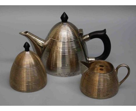 A circa 1950's EPNS three piece tea service of ribbed beehive form with bakelite fittings