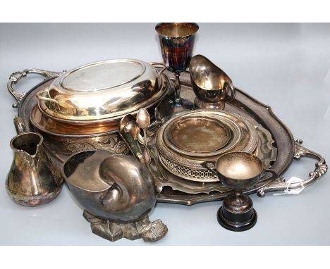 A large Edwardian EPNS twin handled presentation tray, a nautilus shell spoon warmer, covered vegetable tureen and stand and 
