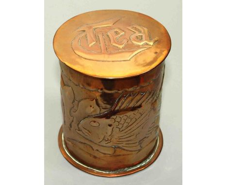 A Newlyn School copper tea caddy, the lidded cylindrical body embossed with fish and leaves, height 9.5cm