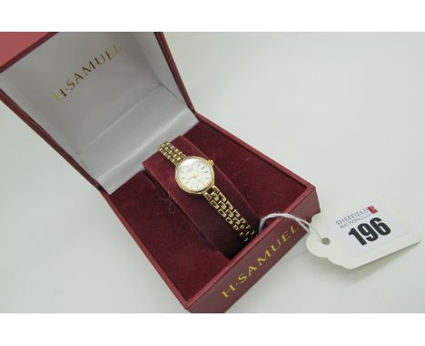 Rotary;  A 9ct Gold Ladies Quartz Wristwatch, the oval signed dial with line markers, in plain case, to integral brick link b