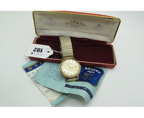 Rotary; A 9ct Gold Cased Gent's Wristwatch, the signed dial with line markers and date aperture, within plain case, on an exp