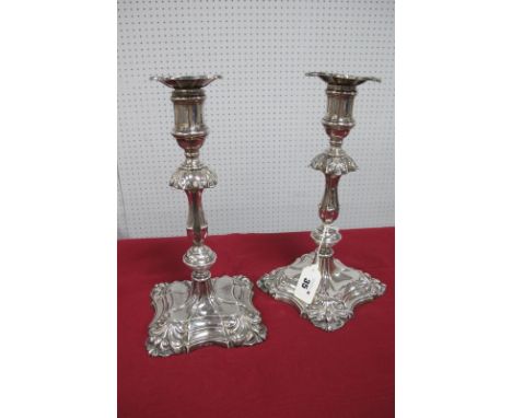A Pair of Hallmarked Silver Candlesticks, JR, Sheffield 1905, each of shaped design, with removable nozzle, on spreading shap