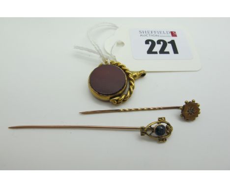 A Victorian Stick Pin, with inset highlight, stamped "9ct" and another of open work design, with collet set centre, stamped "