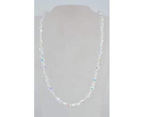A good vintage Aurora Borealis crystal necklace with roller clasp in a vintage lustre pink presentation box. Measures 22 inch