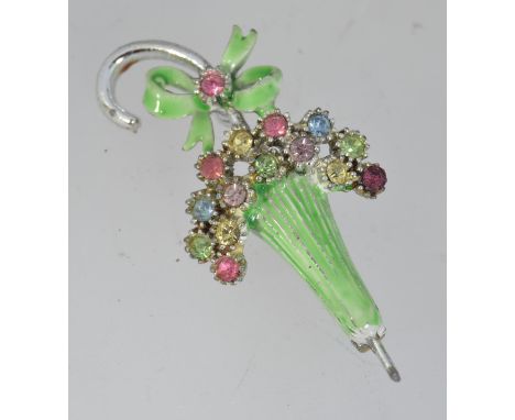 A vintage white metal enamel umbrella flower spray brooch pin set with pastel rhinestones with c clasp. Measures 5.5cms.